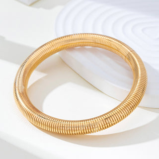 Gold-Tone Flexible Coil Bangle-JOSSLYN by wall to wall-80B1714-The Twisted Chandelier