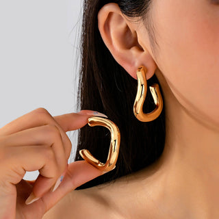 Bold Chunky Gold-Tone U-Shape Hoop Earrings-Earrings-JOSSLYN by wall to wall-80E62229-The Twisted Chandelier