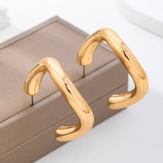 Bold Chunky Gold-Tone U-Shape Hoop Earrings-Earrings-JOSSLYN by wall to wall-80E62229-The Twisted Chandelier